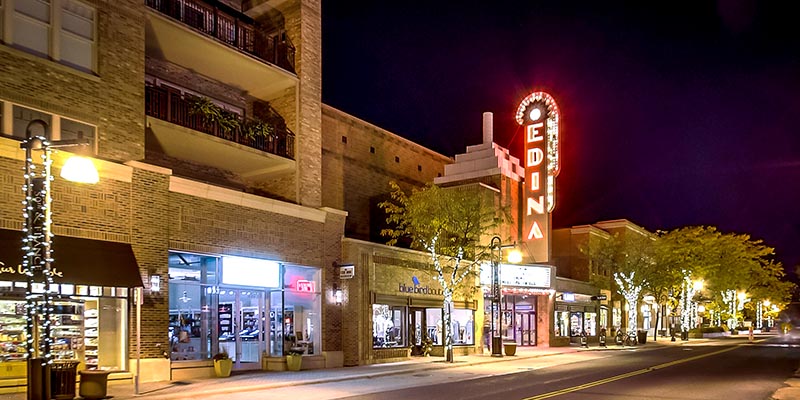Edina Theatre and 50th and France at night.